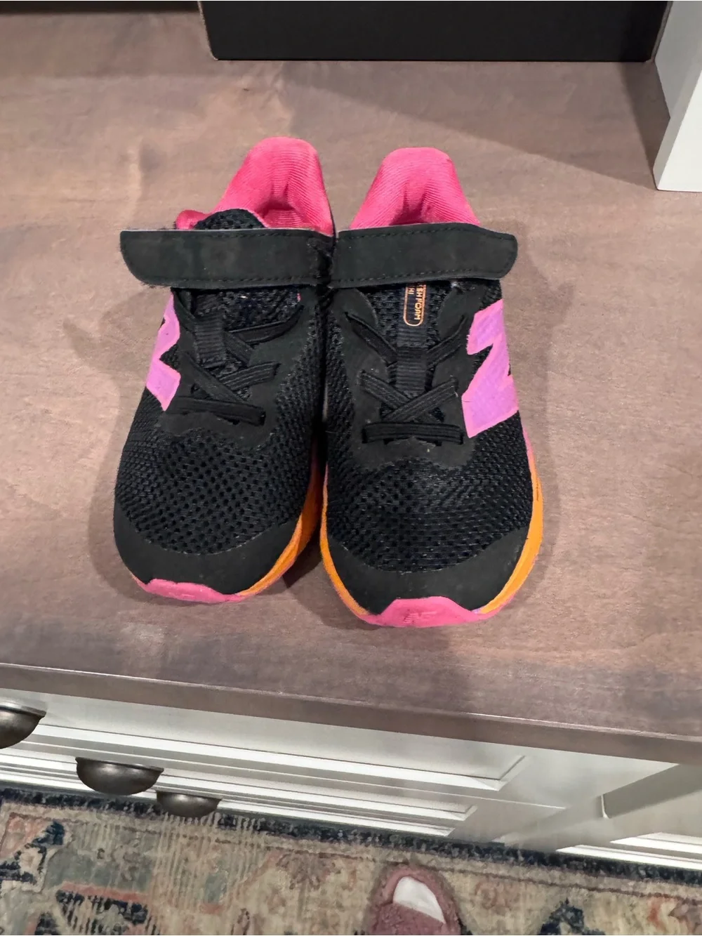 New Balance Black Sneakers with Pink and Orange Accents